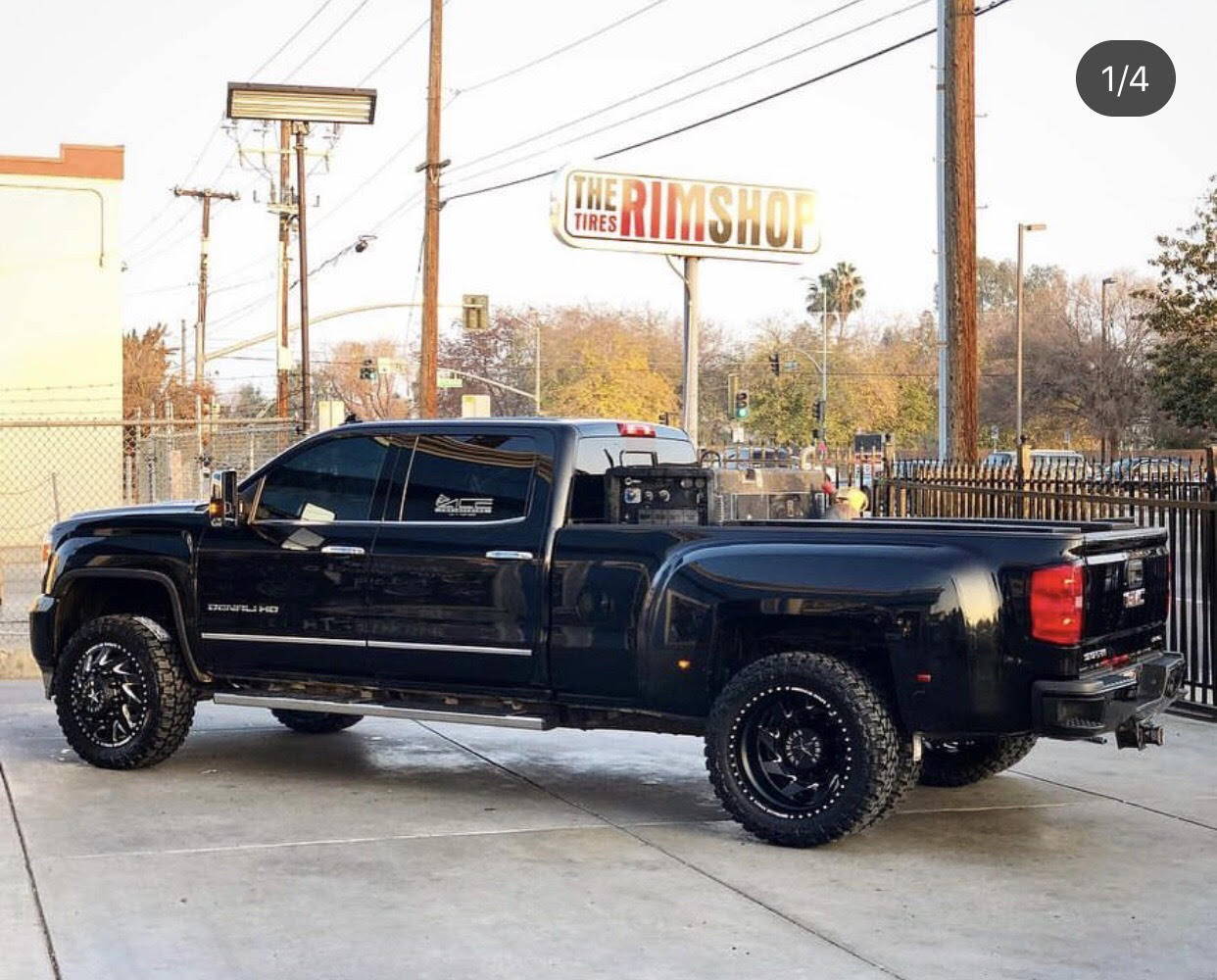 Black Chevrolet Tahoe with custom wheels installed